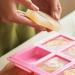 Hands remove soap from a mold