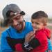 Awdah Hathaleen with his son