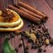  Ingredients for mulled wine on a background of dark wooden planks. Close-up sti