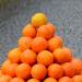 Composition with oranges and a barrel