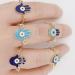 Hamsa Evil Eye Chain Rings on a hand