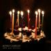 Colourful Beeswax Gala candles lit on as cake