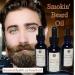 Bue eyed man with tidy beard with Beard: Oil, Smokin'