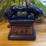 Blue ceramic tzedakah charity coin bank front