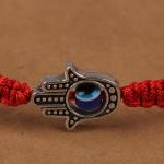 Bracelet: Hamsa Charm with Braided Red Cord closeup