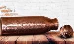 Bottle: Copper Handmade Fairly Traded on side