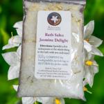 Jasmine Bath Salts in a bag with flowers in the background