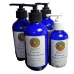 Blue glass bottles with saddle pumps for Raindance Nighttime Renewal Lotion