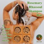 A woman washes her hair with a Rosemary Rhassoul Shampoo Bar