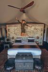 woman_jumping_on_bed-scopio-4x6