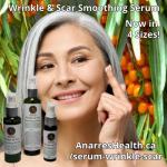 A mature Asian woman applies Wrinkle & Scar Smoothing serum to her cheek